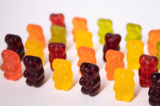 colourful sweet gummy bears isolated on white background.