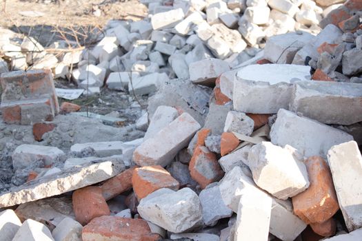 pile of old used bricks. background. construction of houses.