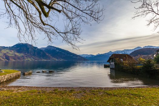 Stunning view of the Lake Thun and the Alps in autumn on the lake side in Spiez, Canton of  Bern, Switzerland