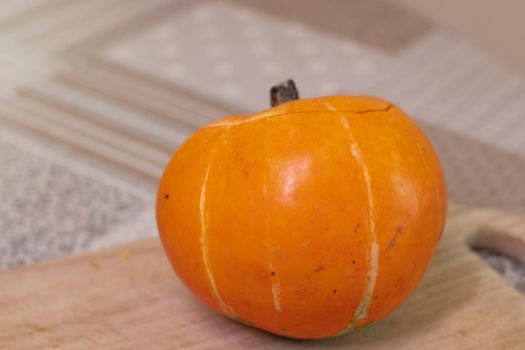 the process of making a Halloween pumpkin. horror theme and Hallowe'en.