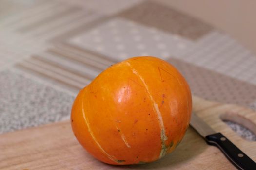 the process of making a Halloween pumpkin. horror theme and Hallowe'en.