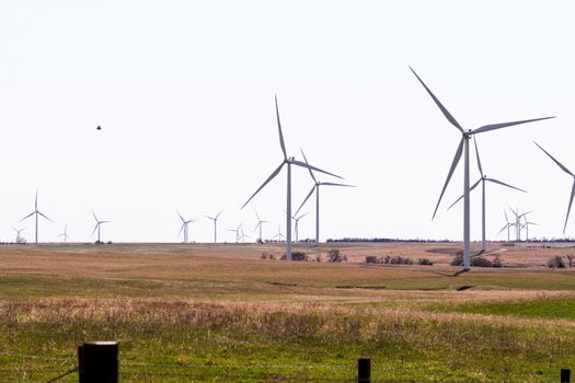 O'Neill, Nebraska, US July 22, 2019 Wind Farm In Nebraska Farm Land Wind Power Turbine Up Close. High quality photo