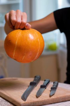 the process of making a Halloween pumpkin. horror theme and Hallowe'en.