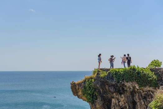 Balangan Beach, Bali, Indonesia : 2018 april 29 : Tourist take a picture en the viw point of Balangan Beach, Bali, Indonesia