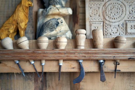 Wood carving tool Carpenter tools in stand at workplace Handmade woodworking instrument for woodwork hobby