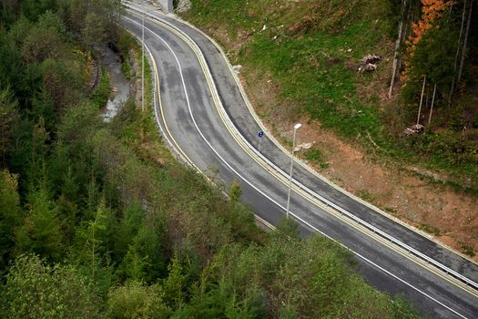 Mountain road Aerial view of road through forest Nobody