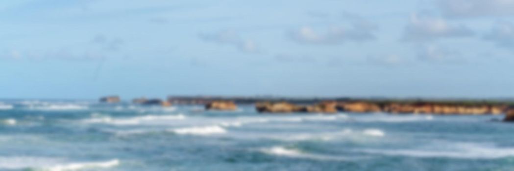 Blurry image of Bay Of Martyrs on Great Ocean Road Australia - blurred seascape for use as a background