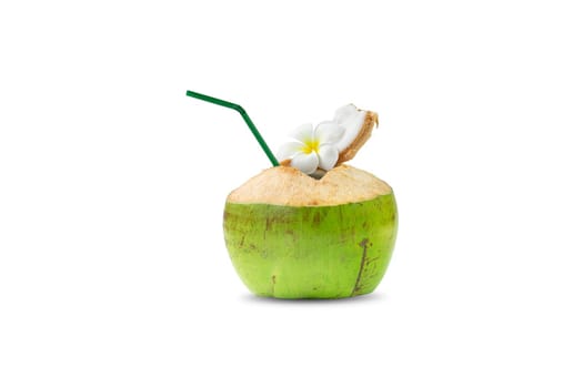Fragrant coconut with holes inserted into a tube for drinking water inside of the coconut, on white background.