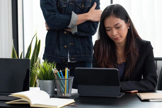 Business adviser analyzing financial figures denoting the progress in the work of the company