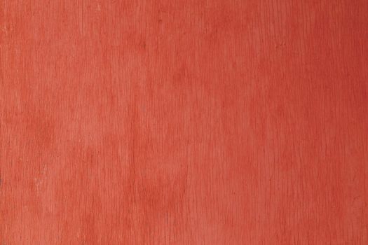 old red painted plywood flat surface texture and background with even vertical cracks