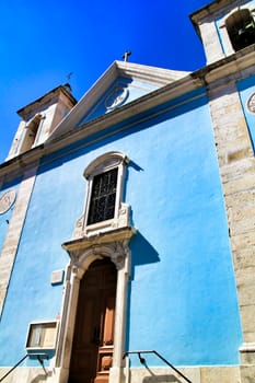 Beautiful facade of Nossa Senhora do Bom Sucesso church in Cacilhas, Lisbon, in a sunny day of Spring