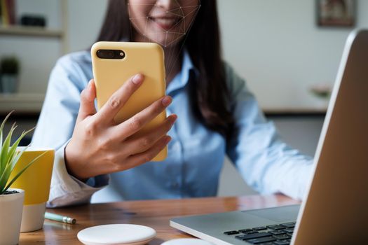 A businesswoman completes KYC using an online banking program in order to open a digital savings account. The definition of cyber security