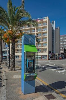 SPAIN, Lloret de Mar-OCTOBER 04, 2019: Pay phone on a city street. Stock photo.