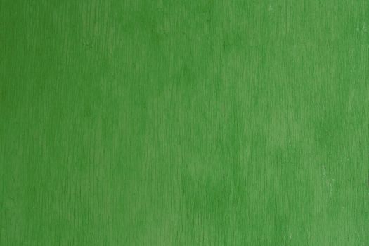 old green painted plywood flat surface texture and background with even vertical cracks