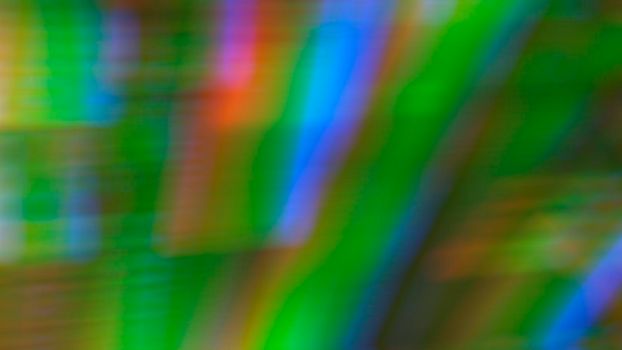 Abstract blurry green rainbow neon background