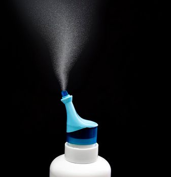 A children nasal spray on a black background