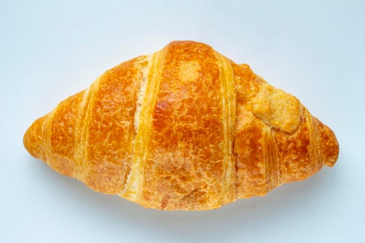 A Croissant on a white background.