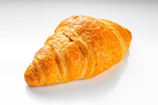 Front view of A Croissant on a white background.