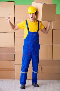 Man contractor working with boxes delivery