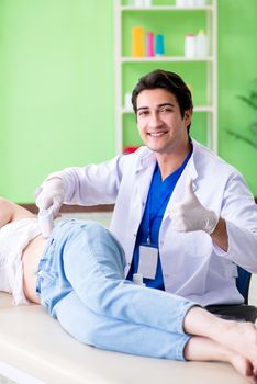 Pregnant woman visiting radiologyst for ultrasound 