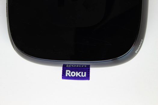 Calgary, Alberta, Canada. April 28, 2020. Top view of a Roku box on a white background