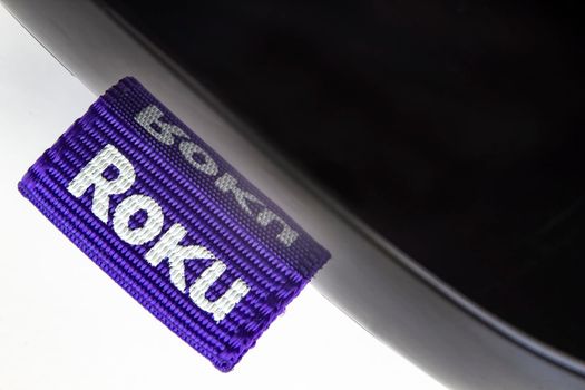 Calgary, Alberta, Canada. April 28, 2020. Macro Top view of a Roku box on a white background