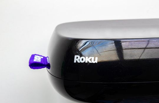 Calgary, Alberta, Canada. April 28, 2020. Front left view of a Roku box on a white background