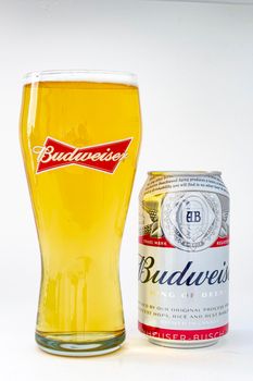 Calgary, Alberta. Canada. May 25, 2020. An isolated Budweiser beer pint with a can beer on the right on a white background