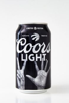 Calgary, Alberta, Canada. May 1, 2020. A beer can of Coors Light special edition black can raptors, on a white background