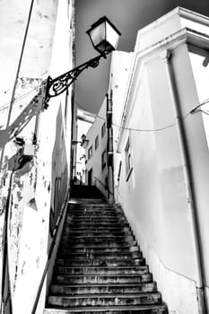 Old colorful houses and narrow streets of Lisbon, Portugal in Spring.