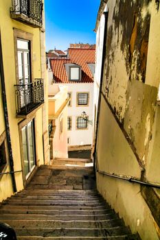Old colorful houses and narrow streets of Lisbon, Portugal in Spring.