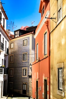 Old colorful houses and narrow streets of Lisbon, Portugal in Spring.