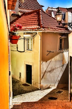 Narrow and colorful streets, majestic facades, windows and balconies of Lisbon, Portugal