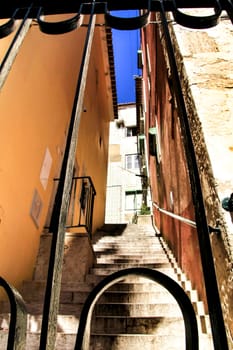 Narrow and colorful streets, majestic facades, windows and balconies of Lisbon, Portugal