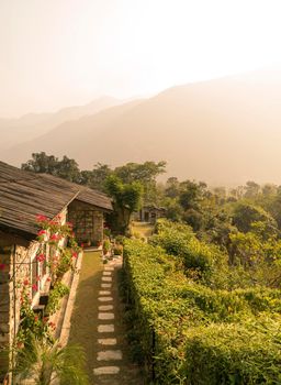 Village in Himalayas Nepal at sunrise. Tourism and traveling in Nepal