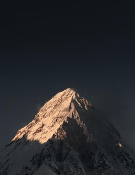 Pumori summit or peak at dawn during sunset. Trekking and climbing in Nepal