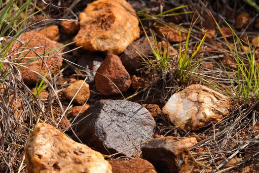 Natural magnetite iron ore deposit with granite and quartz rocks, South Africa