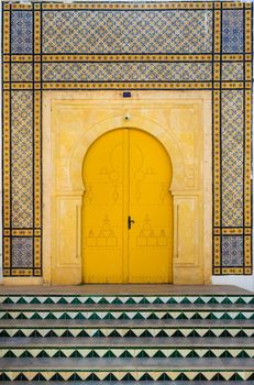 Traditional Tunisian door with tiles and ornament as symbol of Tunisia