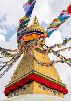 Boudhanath Stupa and prayer flags in Kathmandu, Nepal. Buddhist stupa of Boudha Stupa is one of the largest stupas in the world