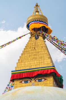 Boudhanath Stupa and prayer flags in Kathmandu, Nepal. Buddhist stupa of Boudha Stupa is one of the largest stupas in the world