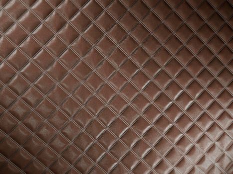 Alligator or crocodile brown Leather. Square stitched texture or background with bumps. 3d render, 3d illustration