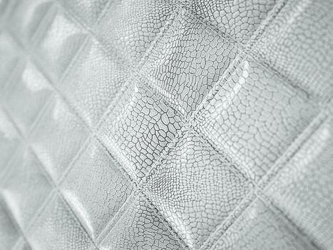 Alligator or snake Leather. Square stitched texture or background with bumps. Artistic shallow DOF 3d render, 3d illustration
