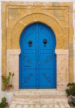 Old Blue door with arch from Tunisia. Sidi Bou Said