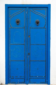 Traditional Blue door with ornament from Tunisia Sidi Bou Said