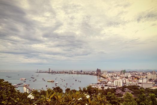 Vintage style, high view on viewpoint see cityscape at the beach and the sea of Pattaya Bay, beautiful landscape of Pattaya City landmark in Chonburi, Travel Asia to Thailand