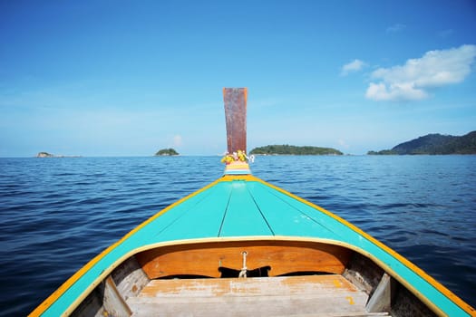 Travellers Long tail boats to visit the island.