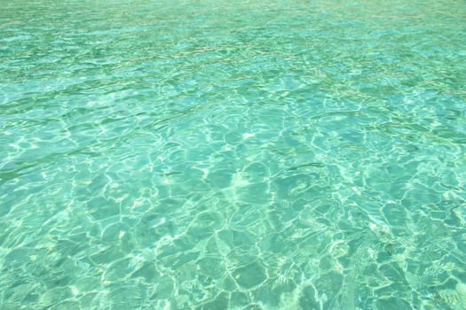 Beach perfect white sand. Crystal green waters.