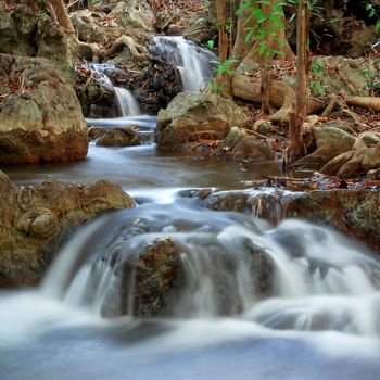 Waterfall Creek in summer forest in Kanchanaburi Thailand