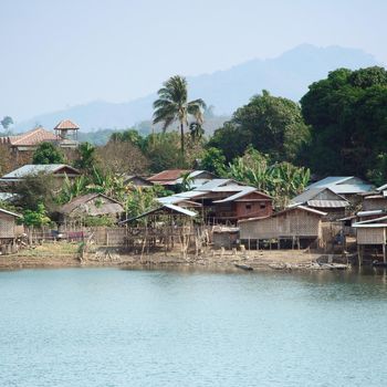 Country house adjacent freshwater lake in Thailand.