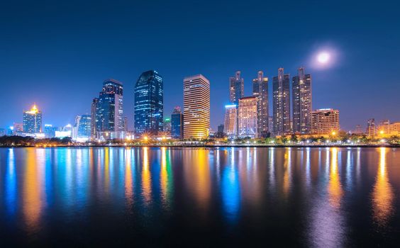 Bangkok city downtown at night with reflection of skyline, Bangkok,Thailand